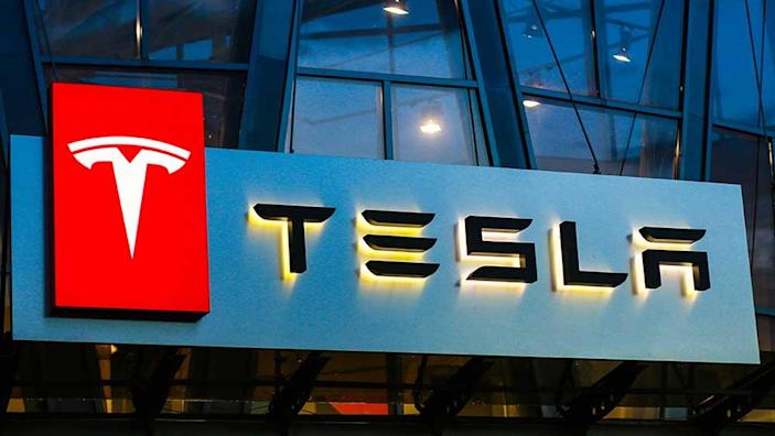 Tesla beats earnings expectations, stock price climbs 2.2%